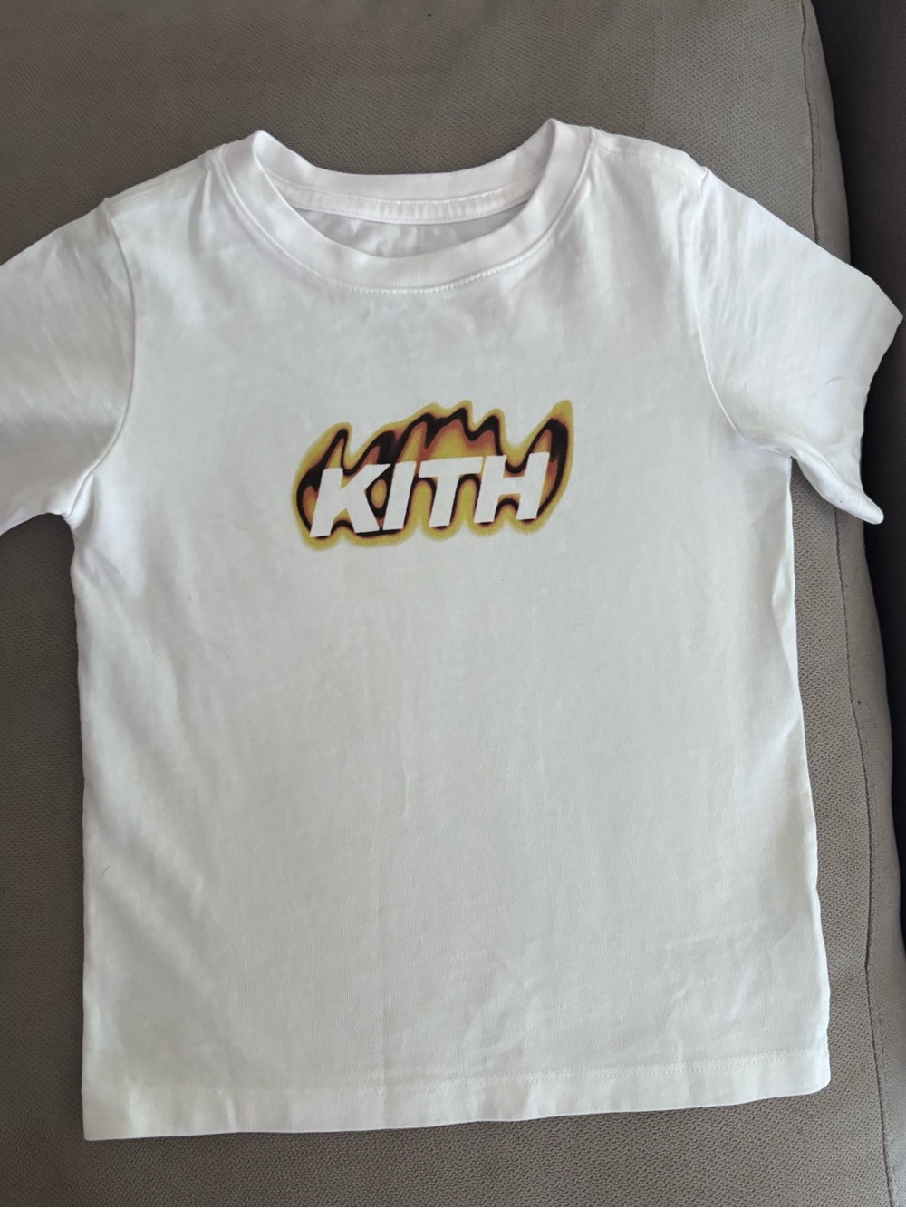 Kith White Tee with Yellow-Orange Flame Logo